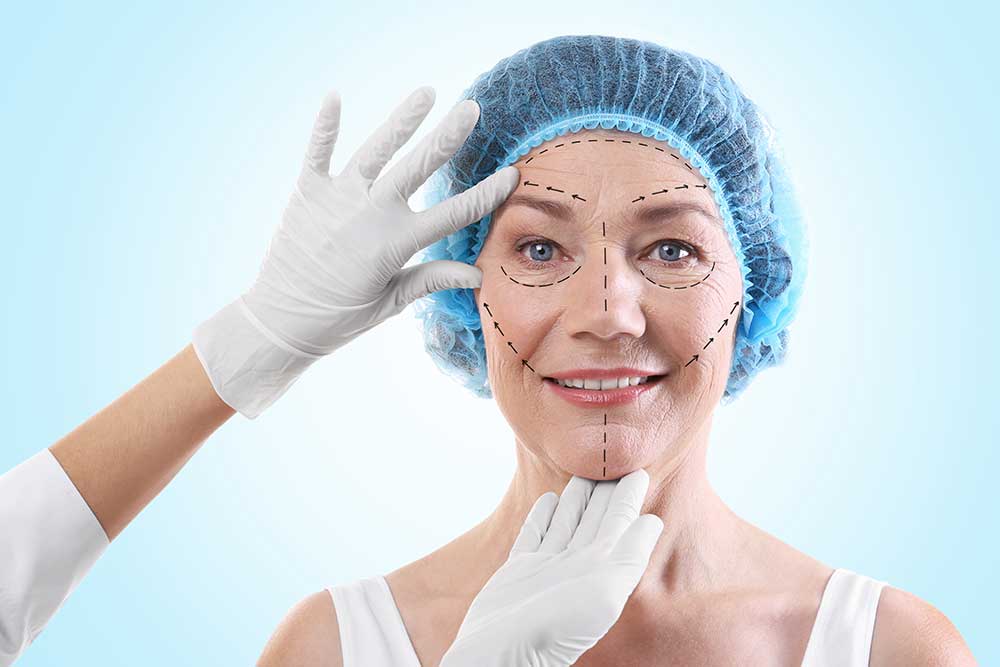 Surgeon,Examining,Female,Face,Against,Blue,Background.,Plastic,Surgery,Concept